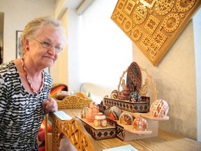 Mary Kozak looks at some Ukrainian Easter Eggs made by her motherJuliana Hrobelsky at the Ukrainian Centre on Sunday. A celebration of Ukrainian's in Canada for 125 years was held as part of culture days. (Gino Donato/Sudbury Star)