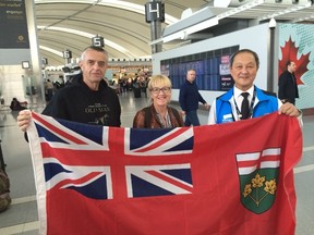 Mayor Hec, his wife Sandy and Jacob Pinharry at Pearson airport on Sunday (Joe Warmington/Toronto Sun/Postmedia Network)