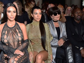 Kim Kardashian, Kourtney Kardashian, Kris Jenner and Corey Gamble attend the Balmain show as part of the Paris Fashion Week Womenswear  Spring/Summer 2017  on September 29, 2016 in Paris, France.  (Photo by Pascal Le Segretain/Getty Images)