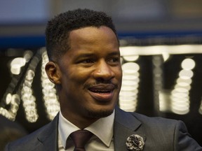 Director and actor Nate Parker arrives on the red carpet for the film "Birth of a Nation" during the 2016 Toronto International Film Festival in Toronto on Friday, Sept. 9, 2016. (THE CANADIAN PRESS/Chris Young)