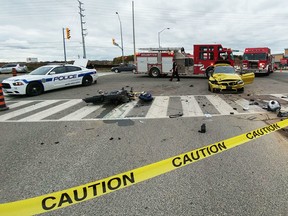 A motorcycle rider was killed after colliding with a sedan at the intersection of Steeles and Financial in Brampton on Monday Oct. 3, 2016.  (Pascal Marchand/Toronto Sun)