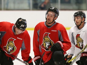 Mark Stone (centre) of the Senators takes a break during first day of training camp at the Bell Sensplex in Ottawa on Sept. 23, 2016. Stone is nearing a return from a concussion. (Jean Levac/Postmedia)
