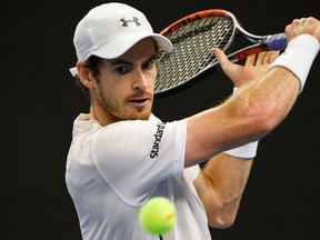 Britain's Andy Murray returns to Andreas Seppi of Italy during their men's singles first round match at the China Open tennis tournament in Beijing on October 4, 2016. (FRED DUFOURFRED DUFOUR/AFP/Getty Images)