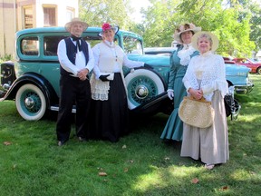 Golden oldies? Well, gold stars all around! Tillsonburg Cruisers recently brought their beautifully-restored autos of the past for showing at Annandale National Historic Site. Adding to the show were some citizens of the past, who will be ghosts of themselves, telling of their lives at a tombstone tour of Tillsonburg Pioneer Cemetery on Saturday, October 8, at 7 p.m. Tickets are available at Annandale House, 30 Tillson Ave. Shown in front of a beautiful Buick are from left George Tillson (Reg Hayward), Emily Amelia (Penny Durst), Mary Ann Tillson (Sherry Hamilton) and Ada Burn (Joan Weston). CONTRIBUTED PHOTO - BILL PRATT