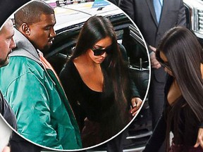Kim Kardashian touched down in New York City Monday morning, just hours after she was held at gunpoint in Paris — see the photos on RadarOnline.com!