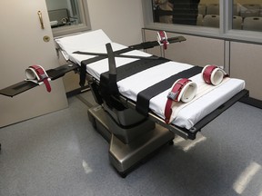 This Oct. 9, 2014, file photo shows the gurney in the the execution chamber at the Oklahoma State Penitentiary in McAlester, Okla.  (AP Photo/Sue Ogrocki)