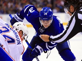 Auston Matthews of the Toronto Maple Leafs takes a face-off during an NHL pre-season game against the Montreal Canadiens at Air Canada Centre on Oct. 2, 2016 in Toronto. (Vaughn Ridley/Getty Images)