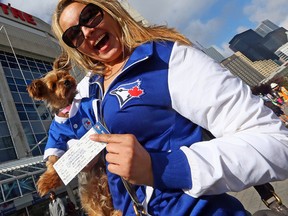 Violet Szot got her tickets ahead of the Jays' Wild Card game at the Rogers Centre on Oct. 4, 2016. (Dave Abel/Toronto Sun)