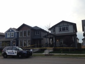 Edmonton police taped off a home on McConachie Blvd in northeast Edmonton Tuesday morning after reports of an aggravated assault and break and enter. PAIGE PARSONS/ Postmedia