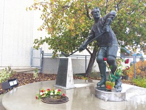 This Gordie Howe statue is outside of SakTel Centre, site of a Sept. 25 ceremony to inter his ashes with those of wife Colleen. (Lance Hornby/Postmedia)
