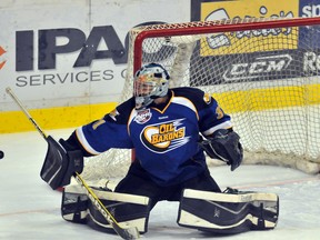 Fort McMurray Oil Barons goalie Zach Fortin makes a save against the Grande Prairie Storm in this Postmedia file photo. Fortin, 21, has joined the Petrolia Squires after a four-year junior hockey career that included stops with four Quebec Major Junior Hockey League teams. (LOGAN CLOW, Postmedia Network)