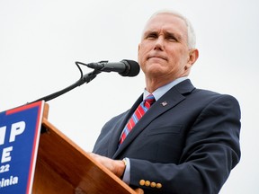 Republican vice-presidential nominee Indiana Gov. Mike Pence speaks at a rally on the Rockingham County Fairgrounds Wednesday, Oct. 5, 2016, in Harrisonburg, Va. (Nikki Fox/Daily News-Record via AP)