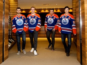 (left to right) Jordan Eberle, Connor McDavid, Milan Lucic , and Ryan Nugent-Hopkins walk out of the Oilers' dressing room following an Edmonton Oilers' practice at Rogers Place, in Edmonton on Wednesday Oct. 5, 2016. DAVID BLOOM/Postmedia