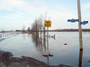 Files: An expanse of land at Fourth Line and Callendor roads in North Gower is sitting under water. With rising temperatures and melting snow, the Rideau Valley Conservation Authority has been urging residents in low-lying areas to take precautions against flooding (Postmedia)