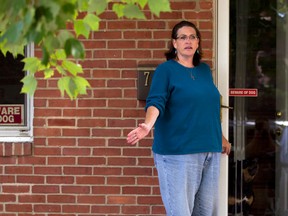 Debbie the wife of Harold Thomas Martin III, talks to reporters outside of her home in Glen Burnie, Md., Wednesday, Oct. 5, 2016. A federal government contractor is accused of stealing highly classified information. The Justice Department on Wednesday announced a criminal complaint against Harold Thomas Martin III of Glen Burnie, Maryland (AP Photo/Jose Luis Magana)