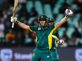 South Africa’s batsman David Miller celebrates after scoring a century during the third ODI against Australia yesterday. Miller finished with 118 runs on 79 balls. (GETTY IMAGES)