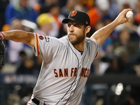 Giants starting pitcher Madison Bumgarner pitched a four-hitter against the Mets in the National League wild-card game in New York on Wednesday, Oct. 5, 2016. (Kathy Willens/AP Photo)