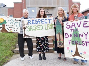 Save the Benny Forest group members Cate Burns, left, Fionna Tough and Karen Rebeiro Gruhl, right,  show their support for Barbara Ronson McNichol, second right,  who made her first appearance at the Sudbury Courthouse  in Sudbury, Ont. on a mischief charge. Wednesday October 5, 2016. John Lappa/Sudbury Star/Postmedia Network