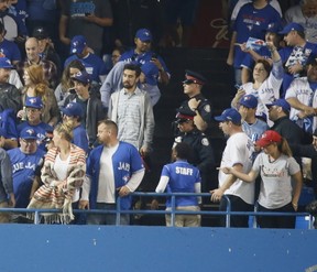 Forget the beer can, why weren't the Jays fans yelling racial slurs kicked  out?