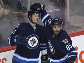 Winnipeg Jets left winger Kyle Connor (left) will get a look with the big club to close out the year. (Brian Donogh/Winnipeg Sun file photo)