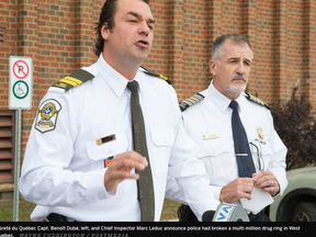 Sûreté du Québec Capt. Benoît Dubé, left, and Chief Inspector Marc Leduc announce police had broken a multi-million drug ring in West Quebec. (Wayne Cuddington, Postmedia)