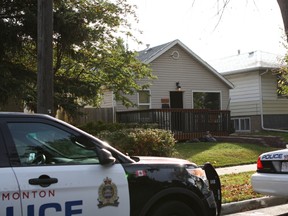 Investigators were on scene at 10141 75 St. in Edmonton on Thursday, Oct. 6, 2016, after a man went to a Second Cup nearby asking for help. CLAIRE THEOBALD / EDMONTON