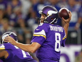 Vikings quarterback Sam Bradford throws a pass during NFL action against the Giants in Minneapolis on Oct. 3, 2016. The Texans and Vikings are among the teams with the top records in the NFL winning with defence first and quarterback second. (Andy Clayton-King/AP Photo)