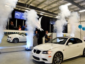 There was great fanfare after the first vehicle was sold during Impact Auto Auctions grand opening of their new facility in Acheson on Monday, Oct. 3, 2016. Reported to be the largest salvage-auction in the country, the facility has 47 acres for vehicle storage and a 12,500 sq. ft.  office, auction and inspection building - Photo by Yasmin Mayne.