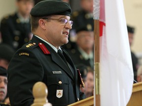 New Canadian Forces Base Kingston base commander Col. Andrew Jayne speaks at the CFB Kingston Change of Command ceremony at Thompson Drill Hall on Thursday. (Ian MacAlpine/The Whig-Standard)
