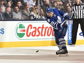 Frank Corrado of the Toronto Maple Leafs shoots the puck up ice during a game against the Nashville Predators on Feb. 23, 2016 at Air Canada Centre in Toronto. (Graig Abel/NHLI via Getty Images)