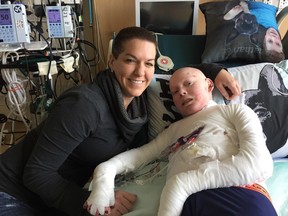 Jonathan Pitre and his mom, Tina Boileau. Taken on Friday October 7, 2016.