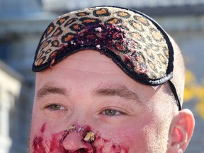 City of Kingston employee Devin Matheson, an environmental Technologist after taking part in a blueberry pie eating contest at Springer Market Square in Kingston on Friday October 7 2016. A total of $2,065.50 was raised for the City of Kingston workplace fundraising campaign for the United Way.Ian MacAlpine /The Whig-Standard