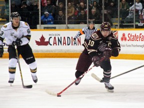 Petes captain Eric Cornel blows by Knight Cliff Pu in the neutral zone during Thursday, Feb. 25, 2016?s game between the London Knights and Peterborough Petes at the Memorial Centre in Peterborough, Ont. (Postmedia Network file photo)