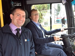 Kingston Transit manager Jeremy DaCosta with bus driver Carolyn Green during a ride-along on Kingston Transit routes this past Monday. (Paul Schliesmann/The Whig-Standard)