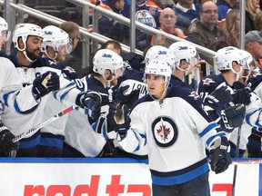 Winnipeg Jets' Brandon Tanev celebrates a goal against the Edmonton Oilers on Thursday night. (THE CANADIAN PRESS/Jason Franson)