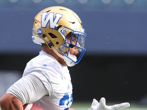 Winnipeg Blue Bombers running back Andrew Harris carries the ball during practice earlier this week. How he performs Saturday against B.C. will go a long way toward determining whether the Bombers win. (Brian Donogh/Winnipeg Sun)