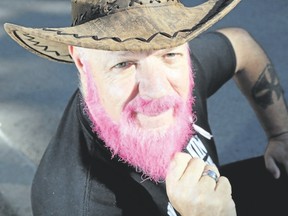 LUKE HENDRY/The Intelligencer
Belleville's Thomas Burtt is thinking pink for 28 days with his dyed beard Friday. Pink is the colour for breast cancer awareness and he's taking pledges for the Canadian Cancer Society. On his 21st birthday, Burtt lost his father to cancer.