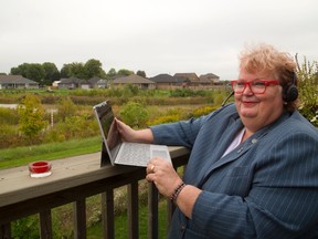 Tech consultant Roberta Fox can live in Thorndale, northeast of London, and direct her 14-employee consulting company from her office or deck, thanks to excellent Internet connectivity. (MIKE HENSEN, The London Free Press)