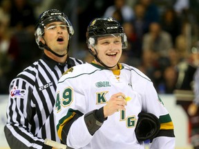 Knights forward Max Jones laughs his way to the penalty box against the Peterborough Petes at Budweiser Gardens on Friday night. (MIKE HENSEN, The London Free Press)