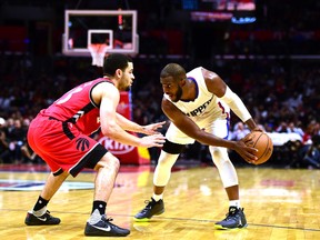 Raptors’ Fred VanVleet squares up against the Clippers’ Chris Paul. VanVleet may have the inside track on the final Raptors’ roster spot. (Getty Images)