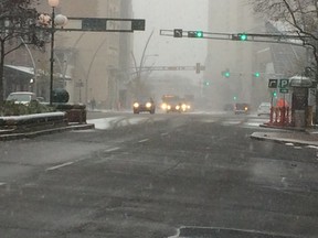 Jasper Avenue was looking like winter during the season's first snowfall Oct. 8, 2016. Gordon Kent / Postmedia