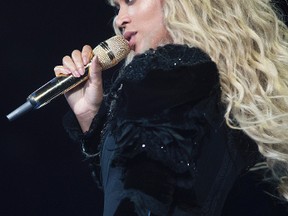 This photo taken Sept. 24, 20016, shows Beyonce performing during the Formation World Tour at Mercedes-Benz Superdome, in New Orleans. Beyoncé wrapped up her "Formation World Tour" with onstage assists from Jay Z, Kendrick Lamar and Serena Williams, while Hugh Jackman, Tyler Perry and Frank Ocean watched from the crowd. The pop star performed Friday, Oct. 7, 2016, at the MetLife Stadium in East Rutherford, New Jersey, singing and dancing to songs from her six solo albums, including her latest effort, "Lemonade." (Daniela Vesco/Invision for Parkwood Entertainment/AP Images)