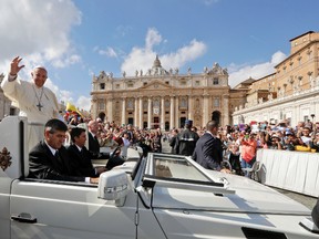 Pope Francis waves to faithful as leaves at the end of a jubilee mass he celebrated in St. Peter's Square, at the Vatican, Sunday, Oct. 9, 2016. Pope Francis has named 17 new cardinals _ 13 of them under age 80 and thus eligible to vote in a conclave to elect his successor. (AP Photo/Andrew Medichini)