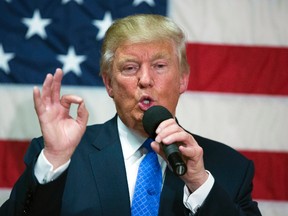 In this Oct. 6, 2016, photo, Republican presidential candidate Donald Trump speaks during a town hall in Sandown, N.H. Trump made a series of lewd and sexually charged comments about women as he waited to make a cameo appearance on a soap opera in 2005. The Republican presidential nominee issued a rare apology Friday, “if anyone was offended.” (AP Photo/ Evan Vucci)