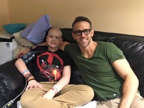 Actor Ryan Reynolds poses for a photo with 13-year-old Connor McGrath that the actor posted on Facebook. Reynolds penned an emotional online tribute to a Newfoundland-born cancer victim Sunday, honouring what would have been McGrath's 14th birthday. (THE CANADIAN PRESS/ho-Facebook)