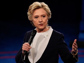 Democratic presidential nominee former Secretary of State Hillary Clinton responds to a question during the town hall debate at Washington University on October 9, 2016 in St Louis, Missouri. This is the second of three presidential debates scheduled prior to the November 8th election. (Photo by Saul Loeb-Pool/Getty Images)
