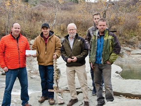 Stephen DeCock, second from left, accepted the Bent Back Award on behalf of the Shell Waterton Complex for the work his summer students did during the Blue Weed Blitz in July. He also donated $3,000 to the Pincher Creek Watershed Group. Brad Bustard accepted on the organization's behalf. 
[Left to right] Brad Bustard, Stephen DeCock, David Green and Michael Gerrand, with Aiden Bustard — the Blitz's youngest volunteer — stands behind. | Caitlin Clow photo/Pincher Creek Echo