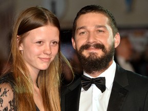 Mia Goth and Shia LeBeouf attend the closing night European Premiere gala red carpet arrivals for 'Fury' during the 58th BFI London Film Festival at Odeon Leicester Square on October 19, 2014 in London, England. (Photo by Anthony Harvey/Getty Images for BFI)