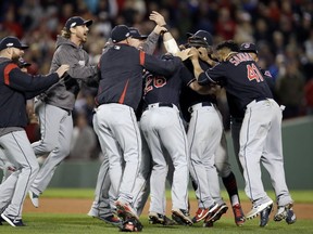 The Cleveland Indians celebrate their 4-3 win over the Boston Red Sox in Game 3 of baseball's American League Division Series, Monday, Oct. 10, 2016, in Boston. (AP Photo/Charles Krupa)
