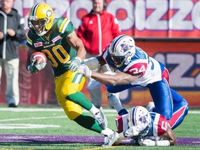 Eskimos running back John White says with the language he uses on-field, TSN is better off not putting a mic on him. (The Canadian Press)